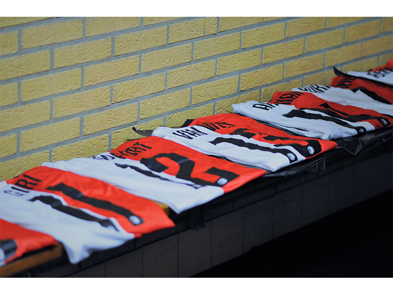 Photo of football shirts with the players name on.