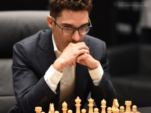 Fabiano Caruana ponders at the start of game 3.